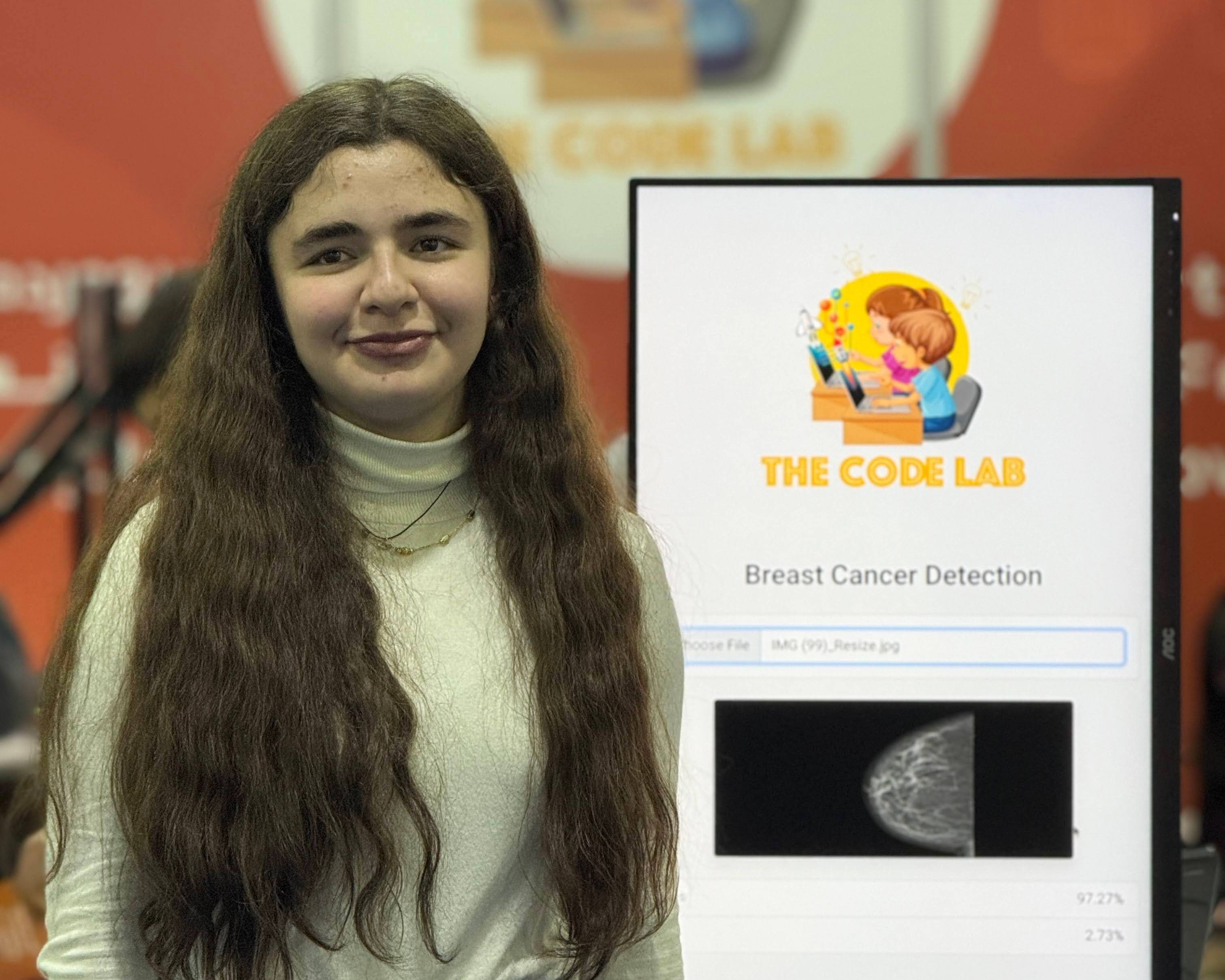 Rana Kovan presenting her AI Breast Cancer Detection Tool at The Code Lab booth, MEDICO 2025, Erbil